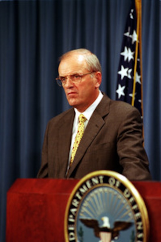 Secretary of the Army Thomas White listens to a reporter's question concerning the role of the service secretaries in the management of the Department of Defense during a Pentagon press briefing on June 18, 2001. 