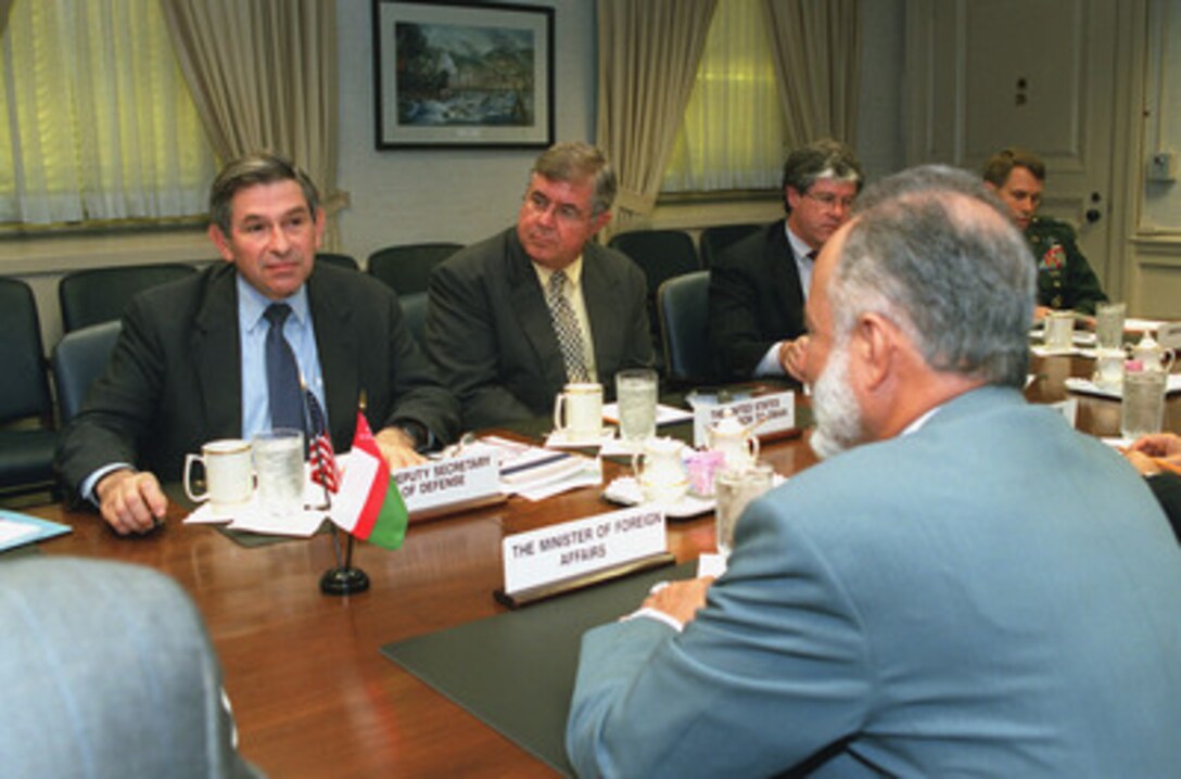 Deputy Secretary of Defense Paul Wolfowitz (left) hosts a meeting at the Pentagon, June 20, 2001, with visiting Minister Responsible for Foreign Affairs Ysuf bin Alawi, of the Sultanate of Oman. A broad range of regional security issues of interest to both nations were discussed. Also participating in the talks, on the American side were (left to right from Wolfowitz): Ambassador John Craig, U.S. ambassador to Oman; Joseph McMillan, acting deputy assistant secretary of defense for Near Eastern and South Asian affairs, and Brig. Gen. John Batiste, senior military assistant to the deputy secretary of defense. 