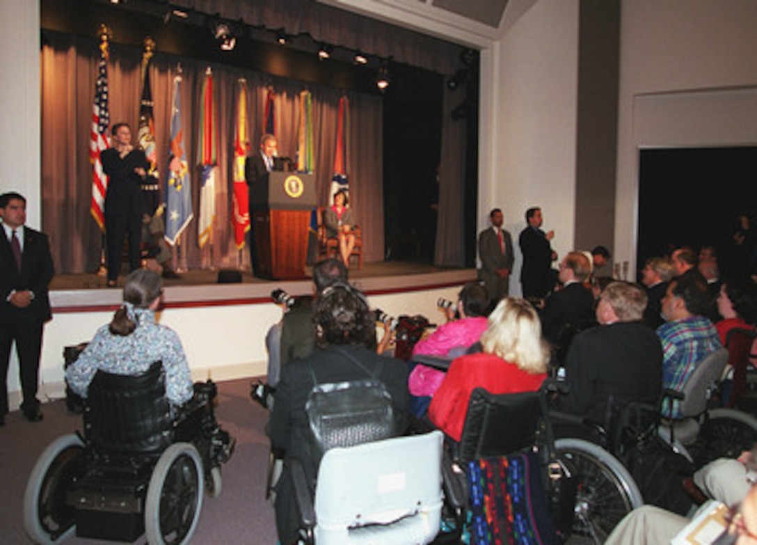 President George W. Bush addresses Department of Defense personnel at the Pentagon on June 19, 2001. President Bush stressed his continued support for employment and accessibility for persons with disabilities. Bush visited the Pentagon Computer/Electronic Accommodations Program Technology Evaluation Center (CAPTEC) which ensures people with disabilities have equal access to the information environment and opportunities in the Federal Government. 