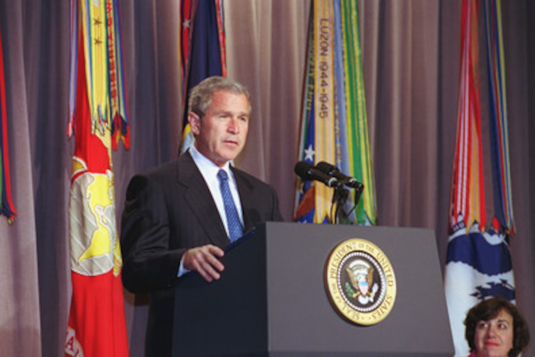 President George W. Bush addresses Department of Defense personnel at the Pentagon on June 19, 2001. President Bush stressed his continued support for employment and accessibility for persons with disabilities. Bush visited the Pentagon Computer/Electronic Accommodations Program Technology Evaluation Center (CAPTEC) which ensures people with disabilities have equal access to the information environment and opportunities in the Federal Government. 