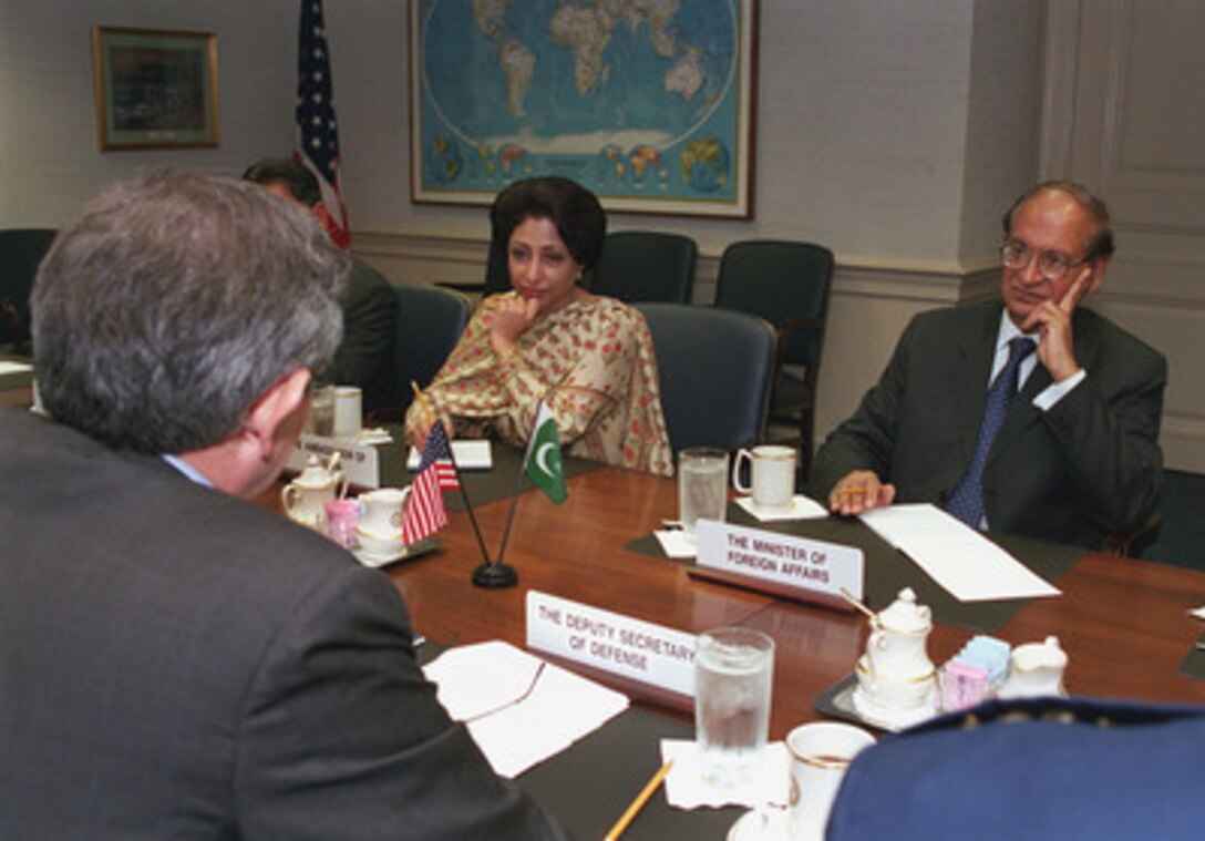 Abdul Sattar (right), Pakistan's minister of foreign affairs, meets with Deputy Secretary of Defense Paul Wolfowitz (left) at the Pentagon, June 19, 2001. Under discussion were a range of regional issues of interest to both nations. Also participating in the talks was Ambassador Maleeha Lodhi (center), Pakistan's ambassador to the United States. 