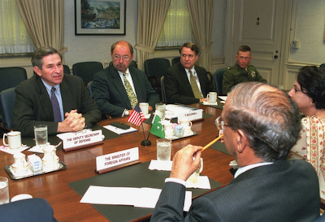 Deputy Secretary of Defense Paul Wolfowitz (left), joined by some of his senior policy advisors, hosts a Pentagon meeting on June 19, 2001, with Pakistan's Minister of Foreign Affairs Abdul Sattar (left foreground). The discussions focused on regional security issues of interest to both nations. 