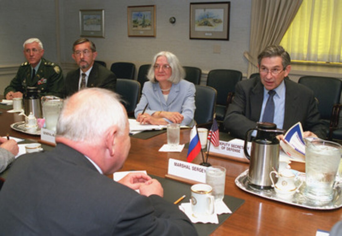 Deputy Secretary of Defense Paul Wolfowitz (right) meets with Marshal Igor Sergeyev (foreground), special advisor to Russian President Vladimir Putin on strategic stability. The talks, held at the Pentagon, June 20, 2001, were aimed at resolving Russia's objections to the U.S. plan to develop defenses against a limited ballistic missile attack, such as might be launched by a rogue state or terrorist organization. Also participating in the discussions on the U.S. side are (L to R): Col. Klaus Mullinex, DoD regional director for Russia; Edward Pusey, acting deputy assistant secretary of defense for Russia, Ukraine, and Eurasia, and Dr. Susan Koch, acting principal deputy assistant secretary of defense for strategy and threat reduction. 