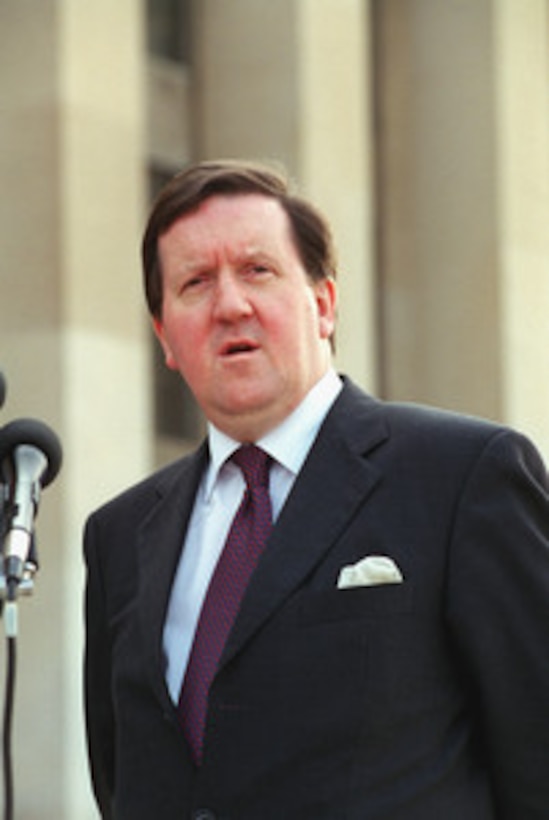 NATO Secretary General Lord George Robertson responds to a reporter's question during a joint media availability following his Pentagon meeting with Secretary of Defense Donald H. Rumsfeld on June 20, 2001. 