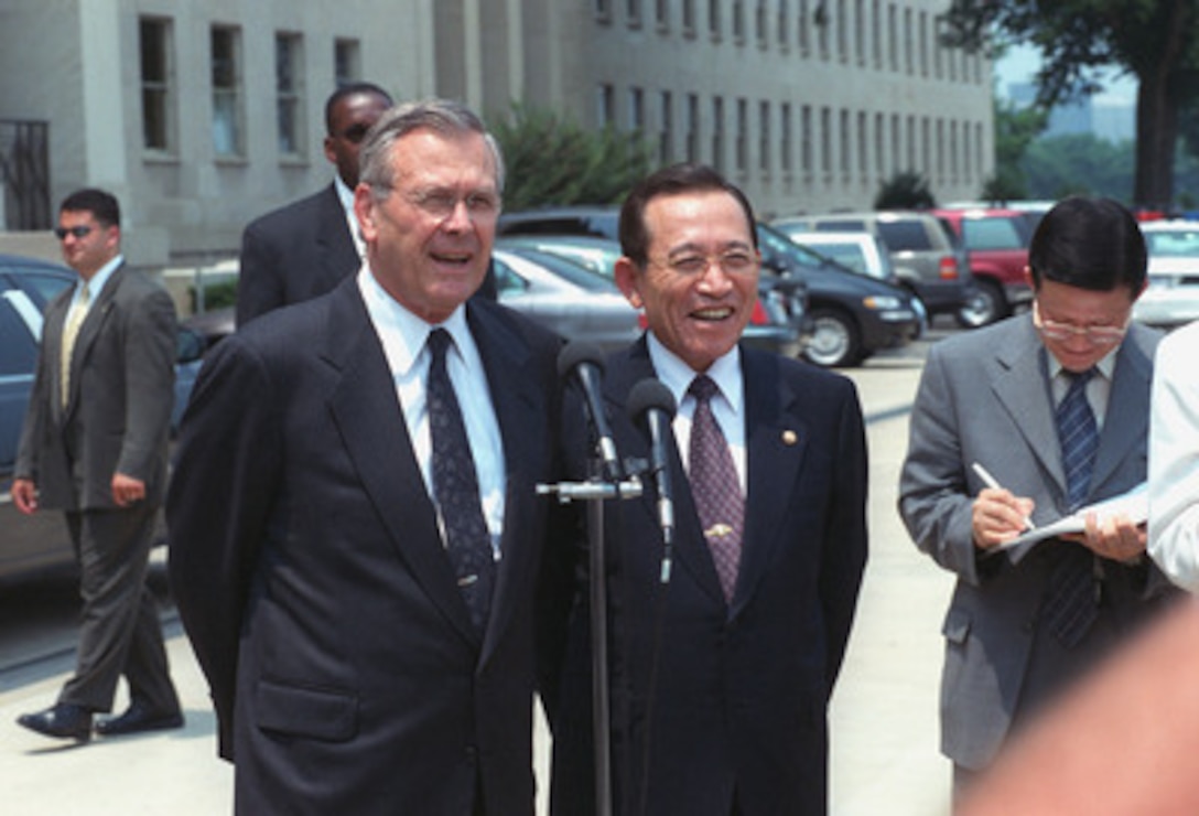 Secretary of Defense Donald H. Rumsfeld (left) and visiting Minister of Defense Kim Dong-Shin (right), of the Republic of Korea, hold a joint media availability at the Pentagon, June 21, 2001. Earlier the two defense leaders met to discuss a range of regional security issues of interest to both nations. 