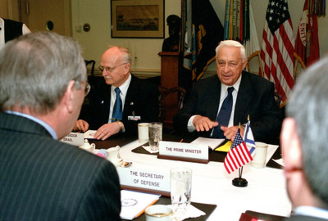 Israeli Prime Minister Ariel Sharon (right) meets in the Pentagon with Secretary of Defense Donald H. Rumsfeld (near left) on March 19, 2001. Sharon and Rumsfeld are meeting to discuss regional and international security issues of interest to both nations. Israeli Ambassador to the U.S. David Ivry joined Sharon in the talks. 