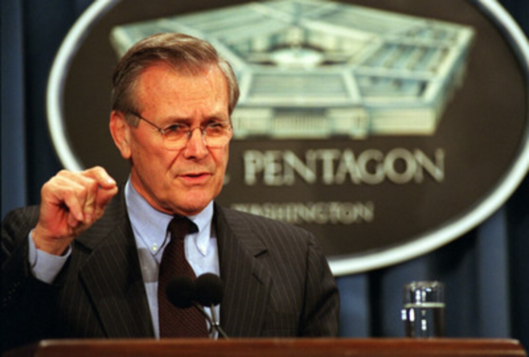 Secretary of Defense Donald H. Rumsfeld responds to a reporter's question during a joint news conference with the United Kingdom's Secretary of State for Defence Geoffrey Hoon, at the Pentagon on March 21, 2001. 