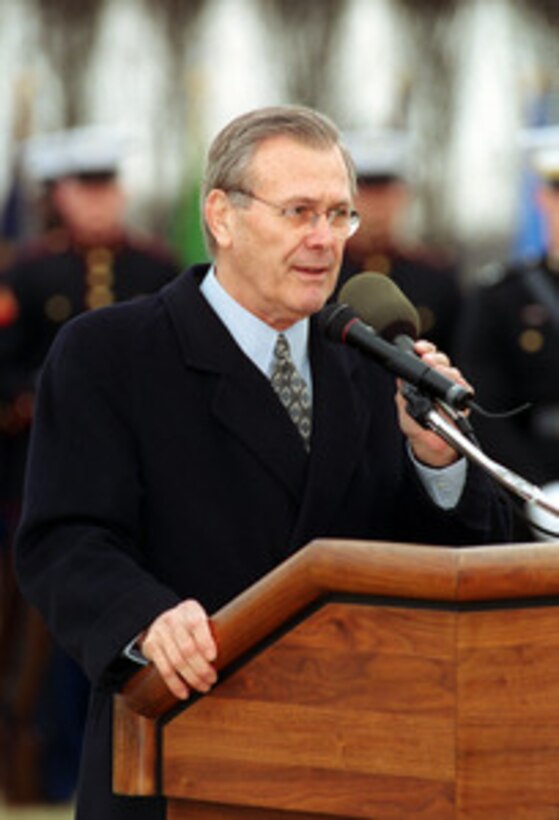 Secretary of Defense Donald H. Rumsfeld introduces Deputy Secretary of Defense Paul Wolfowitz during an armed forces welcoming ceremony in Wolfowitz's honor at the Pentagon on March 16, 2001. 