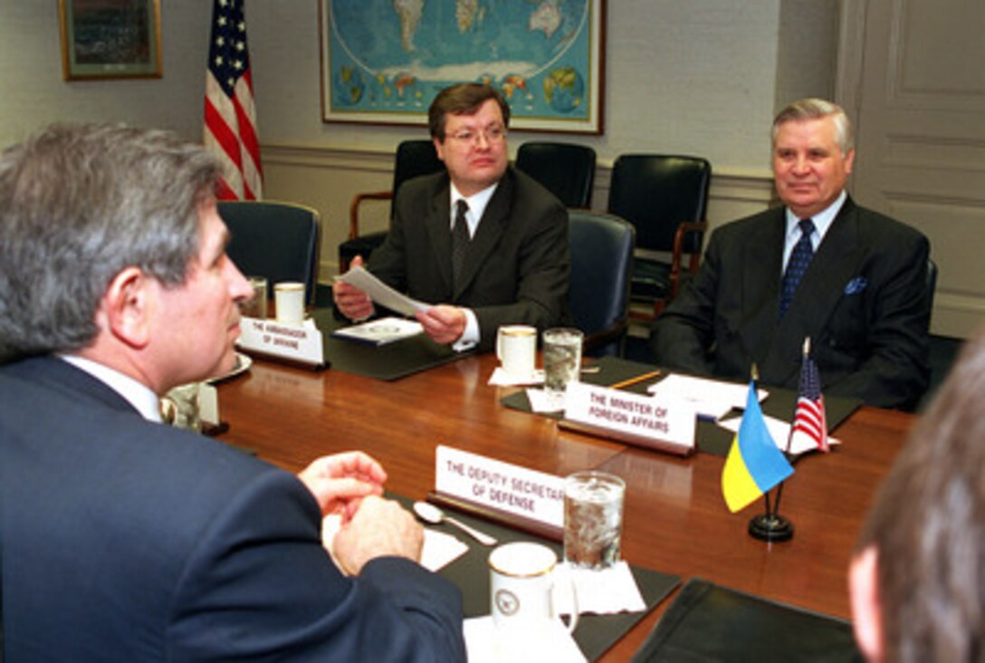 Minister of Foreign Affairs Anatoliy Zlenko, of Ukraine, meets at the Pentagon with Deputy Secretary of Defense Paul Wolfowitz (left) on March 27, 2001. Ukrainian Ambassador to the United States Konstantyne Hryschcenko (center) joined Zlenko and Wolfowitz to discuss a range of regional security issues of interest to both nations. 
