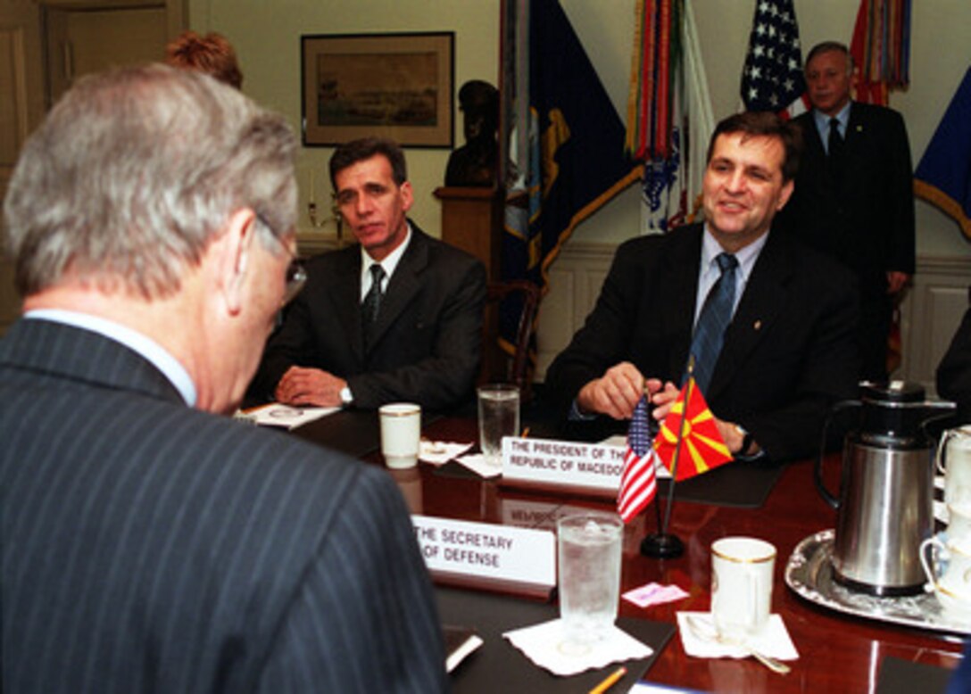 President Boris Trajkovski (right), of the Former Yugoslav Republic of Macedonia, meets with Secretary of Defense Donald H. Rumsfeld (left) at the Pentagon on May 2, 2001. Trajkovski and Rumsfeld, along with Macedonian Vice Prime Minister Bedredin Ibraimi (center), are meeting to discuss regional security issues of concern to both nations. 