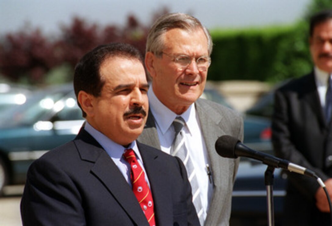 The Amir of Bahrain His Highness Hamad bin Isa Al-Khalifa (left) briefs reporters on his discussions with Secretary of Defense Donald H. Rumsfeld at the Pentagon on May, 8, 2001. The Amir and Rumsfeld met to discuss regional security issues of interest to both nations. 