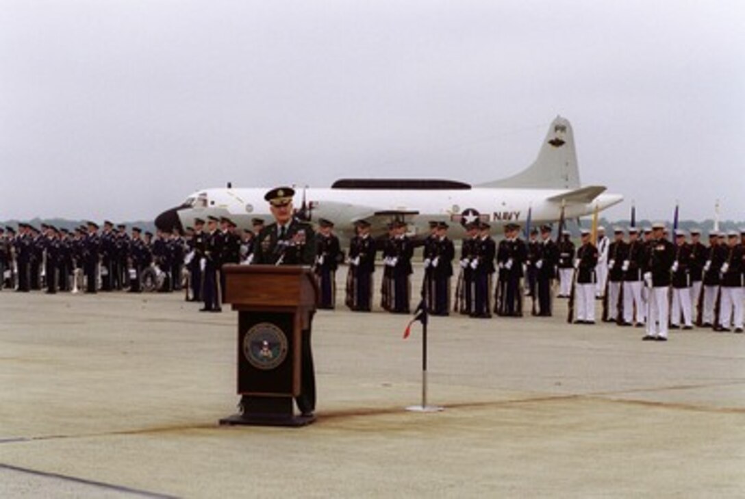Chairman, Joint Chiefs of Staff Henry H. Shelton makes remarks during the opening ceremony of the Joint Services Open House at Andrews Air Force Base, MD, May 18, 2001. In the background is a U.S. Navy EP-3 aircraft, similar to the one used by the crew who were forced to make an emergency landing April 1, 2001, on Hanian Island, Peoples Republic of China. Gen. Shelton presented awards to the 24 member crew during the ceremony which drew thousands of spectators. 
