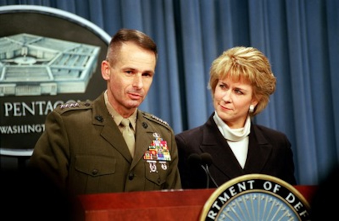 Vice Chairman of the Joint Chiefs of Staff Gen. Peter Pace and Assistant Secretary of Defense for Public Affairs Victoria Clarke hold a Pentagon press briefing on Nov. 7, 2001, to update reporters on the progress of on-going military operations against al-Qaeda and the Taliban in Afghanistan. 