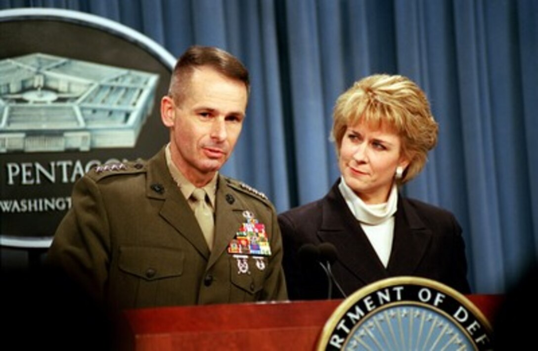 Vice Chairman of the Joint Chiefs of Staff Gen. Peter Pace and Assistant Secretary of Defense for Public Affairs Victoria Clarke hold a Pentagon press briefing on Nov. 7, 2001, to update reporters on the progress of on-going military operations against al-Qaeda and the Taliban in Afghanistan. 