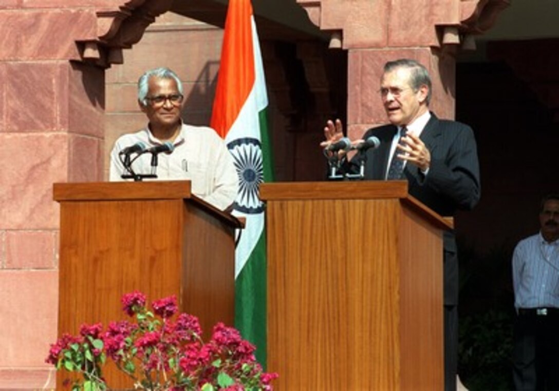 Secretary of Defense Donald H. Rumsfeld (right) conducts a joint media availability with Indian Minister of Defense George Fernandes at the Indian Ministry of Defense in New Delhi, on Nov. 5, 2001. Rumsfeld and Fernandes met earlier to discuss a range of bilateral security issues and the military action now underway in Afghanistan. 
