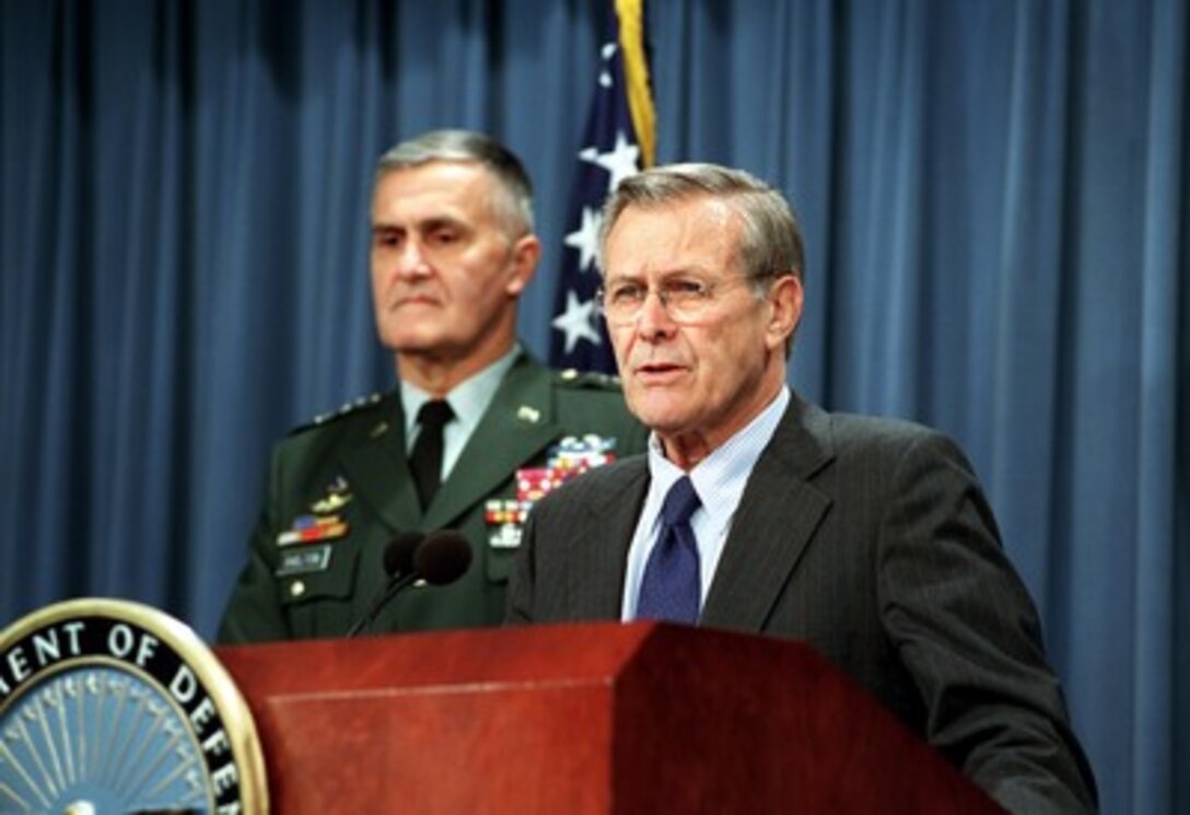 Secretary of Defense Donald H. Rumsfeld responds to a reporter's question during a Pentagon press briefing on Sept. 27, 2001. Rumsfeld announced the Secretary of Defense Medal for the Defense of Freedom. The medal is the civilian equivalent of the Purple Heart and will be awarded to DoD civilian employees who are killed or wounded by hostile action while serving in support of the department. Chairman of the Joint Chiefs of Staff Gen. Henry H. Shelton, U.S. Army, joined Rumsfeld at the briefing. 