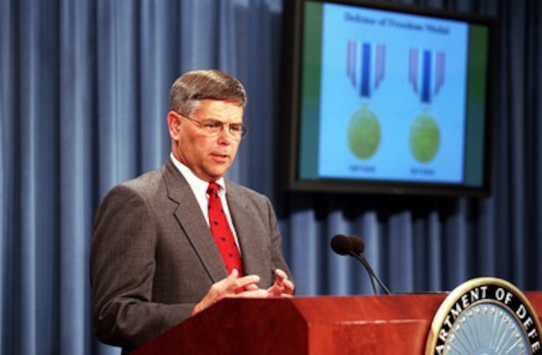 Assistant Secretary of Defense for Force Management Policy Charles Abell explains the criteria for the newly established Secretary of Defense Medal for the Defense of Freedom during a Pentagon press briefing on Sept. 27, 2001. Secretary of Defense Donald H. Rumsfeld earlier announced the establishment of the medal. The medal is the civilian equivalent of the Purple Heart and will be awarded to DoD civilian employees who are killed or wounded by hostile action while serving in support of the department. 