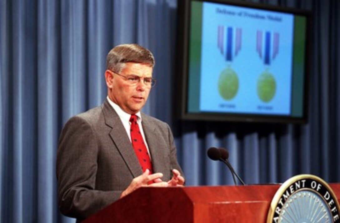 Assistant Secretary of Defense for Force Management Policy Charles Abell explains the criteria for the newly established Secretary of Defense Medal for the Defense of Freedom during a Pentagon press briefing on Sept. 27, 2001. Secretary of Defense Donald H. Rumsfeld earlier announced the establishment of the medal. The medal is the civilian equivalent of the Purple Heart and will be awarded to DoD civilian employees who are killed or wounded by hostile action while serving in support of the department. 