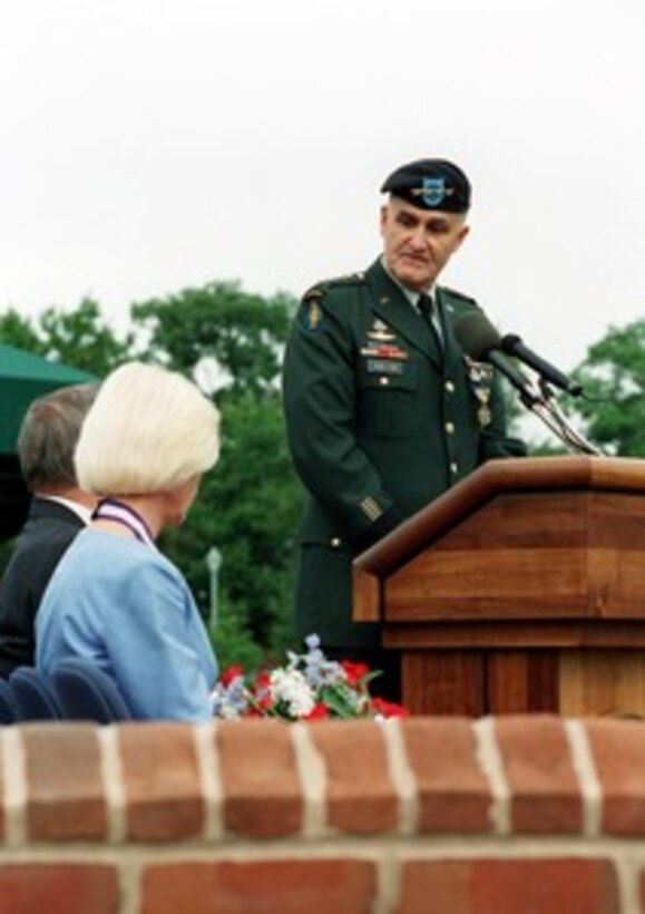 Retiring Chairman of the Joint Chiefs of Staff Gen. Henry H. Shelton, U.S. Army, addresses Secretary of Defense Donald H. Rumsfeld during his retirement ceremony at Fort Myer, Va., on Oct. 2, 2001. Carolyn Shelton joined her husband and Rumsfeld on the dais for the ceremony. 