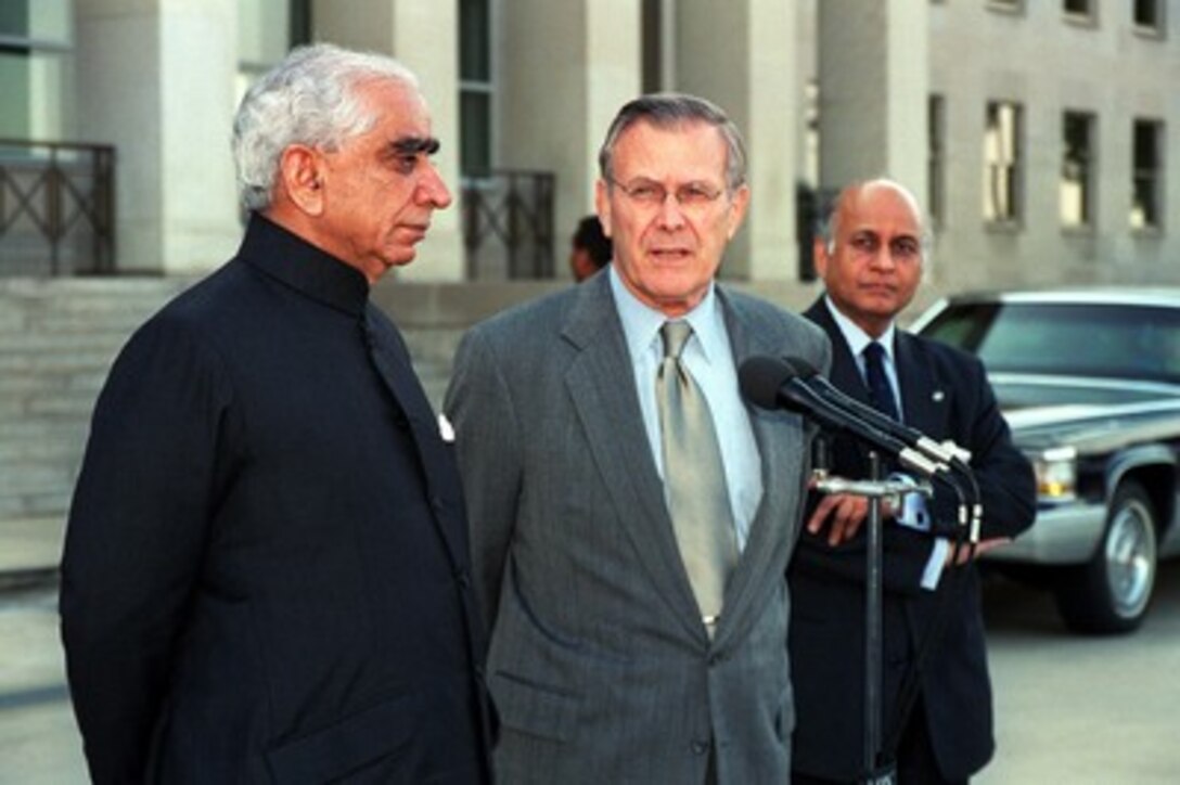 Secretary of Defense Donald H. Rumsfeld (right) and Minister of Defense & External Affairs Jaswant Singh, of India, answer questions for reporters at the Pentagon on Oct. 2, 2001. 