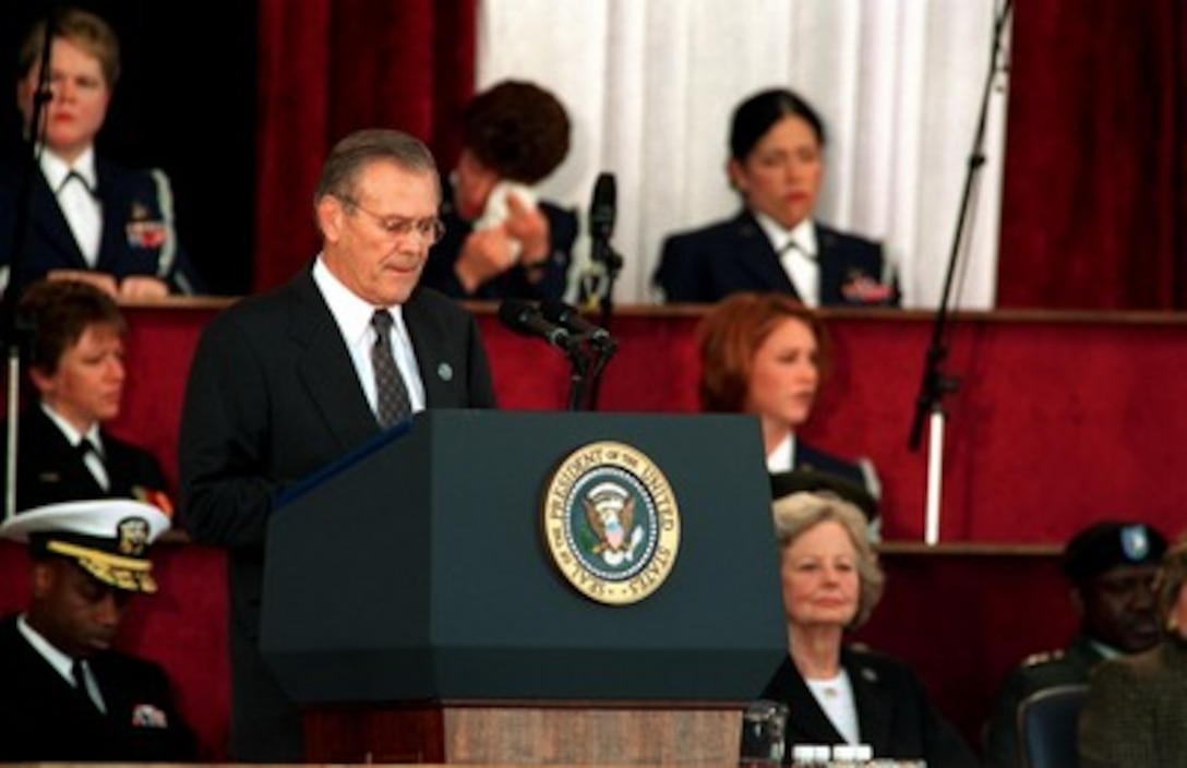 Secretary of Defense Donald H. Rumsfeld addresses the audience at the Pentagon on Oct. 11, 2001, during a memorial service in honor of those who perished in the terrorist attack on the building. President George W. Bush, Rumsfeld and Chairman of the Joint Chiefs of Staff Gen. Richard B. Myers, U.S. Air Force, eulogized the 184 persons killed when a terrorist hijacked airliner was purposely crashed into the southwest face of the building on Sept. 11, 2001. 