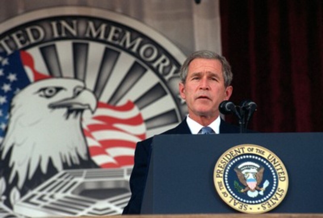 President George W. Bush addresses the audience during the Pentagon memorial service on Oct. 11, 2001, in honor of those who perished in the terrorist attack on the building one-month earlier. Bush, Secretary of Defense Donald H. Rumsfeld and Chairman of the Joint Chiefs of Staff Gen. Richard B. Myers, U.S. Air Force, eulogized the 184 persons killed when a terrorist hijacked airliner was purposely crashed into the southwest face of the building on Sept. 11, 2001. 