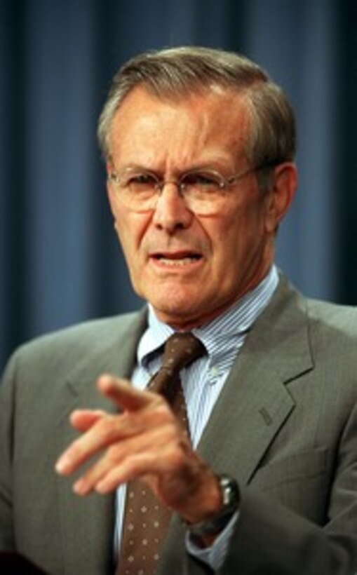 Secretary of Defense Donald H. Rumsfeld responds to a question from a reporter on Operation Enduring Freedom during a joint press conference with Chairman of the Joint Chiefs of Staff Gen. Richard B. Myers, U.S. Air Force, at the Pentagon on October 12, 2001. Rumsfeld and Myers brought reporters up to date on the progress of the on-going air campaign being directed against the al Qaeda terrorist organization and the military capability of Taliban regime in Afghanistan. 