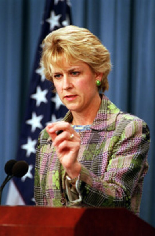 Assistant Secretary of Defense for Public Affairs Victoria Clarke responds to a reporter's question during her first Pentagon press briefing on Sept. 4, 2001. 