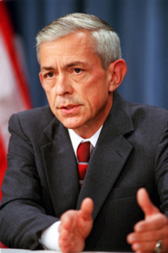 Assistant Secretary of Defense for Reserve Affairs Craig W. Duehring hosts a media roundtable at the Pentagon on Aug. 30, 2001. 