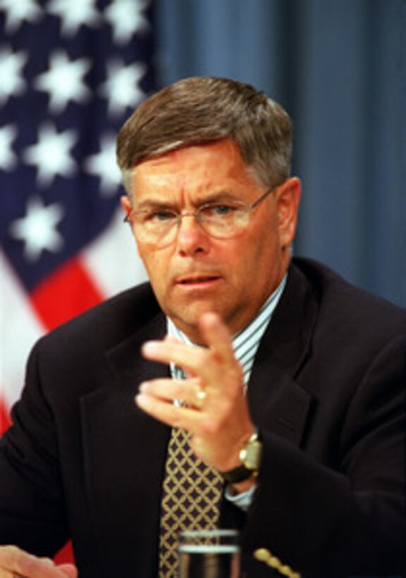 Assistant Secretary of Defense for Force Management Policy Charles S. Abell invites a question from a reporter during a media roundtable at the Pentagon on Aug. 31, 2001. 