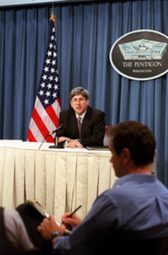 Under Secretary of Defense for Policy Douglas J. Feith responds to a reporter's question during a Pentagon media roundtable on Sept. 4, 2001. 