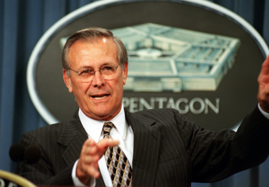 Secretary of Defense Donald H. Rumsfeld talks to reporters about his FY 2002 defense budget proposal during a Pentagon press conference on Sept. 6, 2001. 