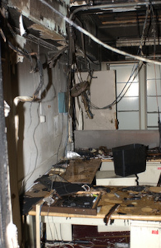 The effect of a flash fire in this fourth floor office inside the Pentagon is shown in this Sept. 14, 2001, photograph. Damage to the Pentagon was caused when the hijacked American Airlines flight slammed into the building on Sept. 11th. The terrorist attack caused extensive damage to the west face of the building and followed similar attacks on the twin towers of the World Trade Center in New York City. 