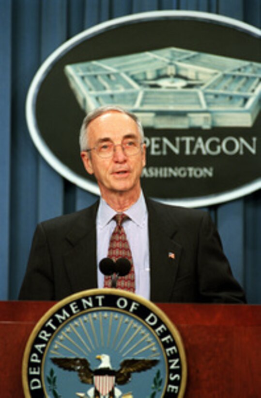 Secretary of the Navy Gordon R. England responds to a reporter's question during a Pentagon briefing on Sept. 13, 2001, concerning naval personnel listed missing from the Sept. 11th terrorist attack on the Pentagon. 