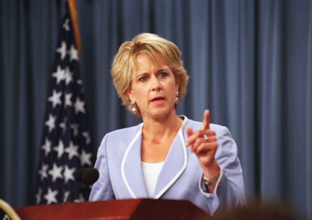 Assistant Secretary of Defense for Public Affairs Victoria Clarke conducts a Pentagon news briefing on Sept. 12, 2001. Clarke was joined by Pentagon officials and the Chief of the Arlington County Fire Department to discuss progress on firefighting and rescue efforts. 