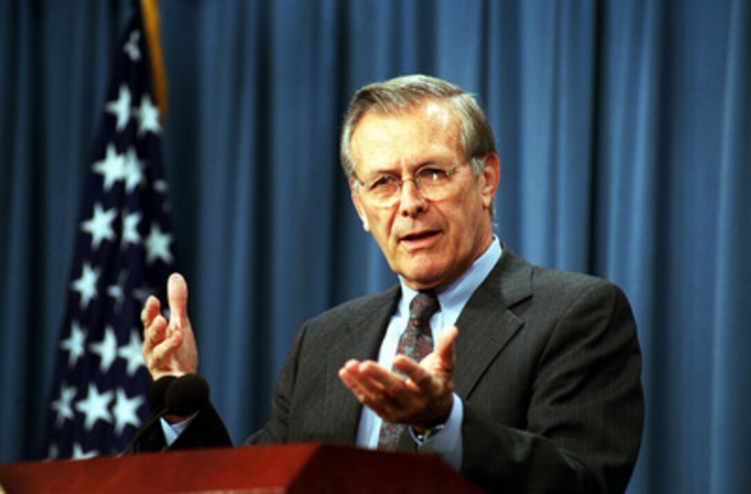 Secretary of Defense Donald H. Rumsfeld briefs reporters in the Pentagon on Sept. 12, 2001. Rumsfeld updated the reporters on the fire fighting and search and rescue efforts at the Pentagon after a hijacked American Airlines flight slammed into the building on Sept. 11th. The terrorist attack caused extensive damage to the west face of the building and followed similar attacks on the twin towers of the World Trade Center in New York City. 