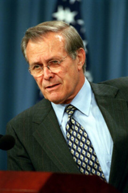 Secretary of Defense Donald H. Rumsfeld briefs reporters in the Pentagon on Sept. 18, 2001. Rumsfeld discussed the call-up of up to 50,000 Reserve and Guard members to augment active duty troops in the fight against terrorists. 