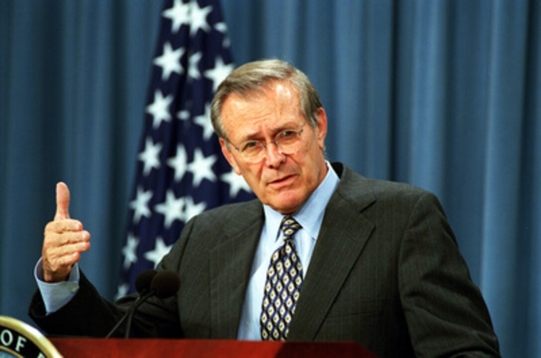 Secretary of Defense Donald H. Rumsfeld briefs reporters in the Pentagon on Sept. 18, 2001. Rumsfeld discussed the call-up of up to 50,000 Reserve and Guard members to augment active duty troops in the fight against terrorists. 