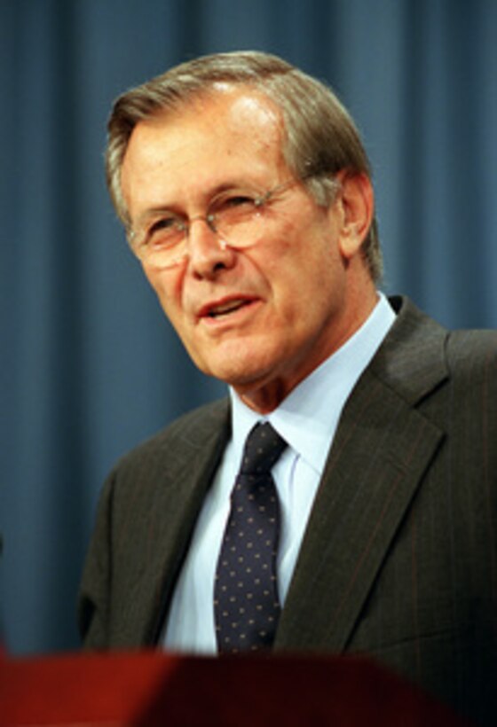 Secretary of Defense Donald H. Rumsfeld briefs reporters in the Pentagon on Sept. 20, 2001. Rumsfeld gave reporters his views on the coming war against terrorism. 