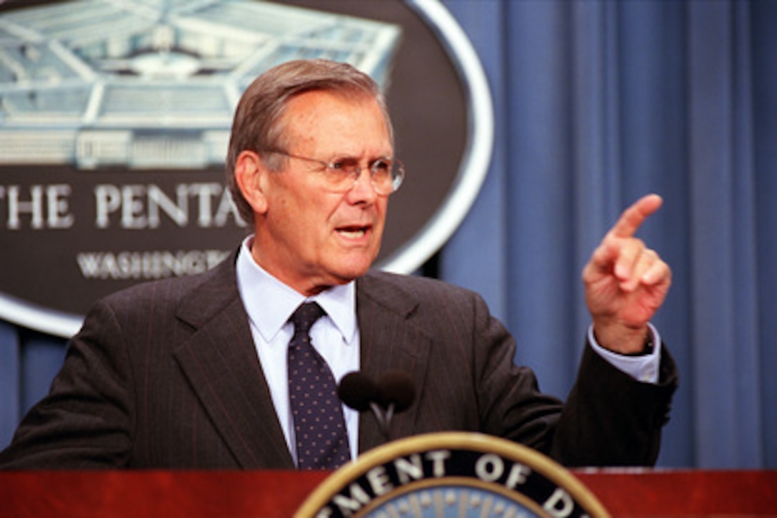 Secretary of Defense Donald H. Rumsfeld briefs reporters in the Pentagon on Sept. 20, 2001. Rumsfeld gave reporters his views on the coming war against terrorism. 