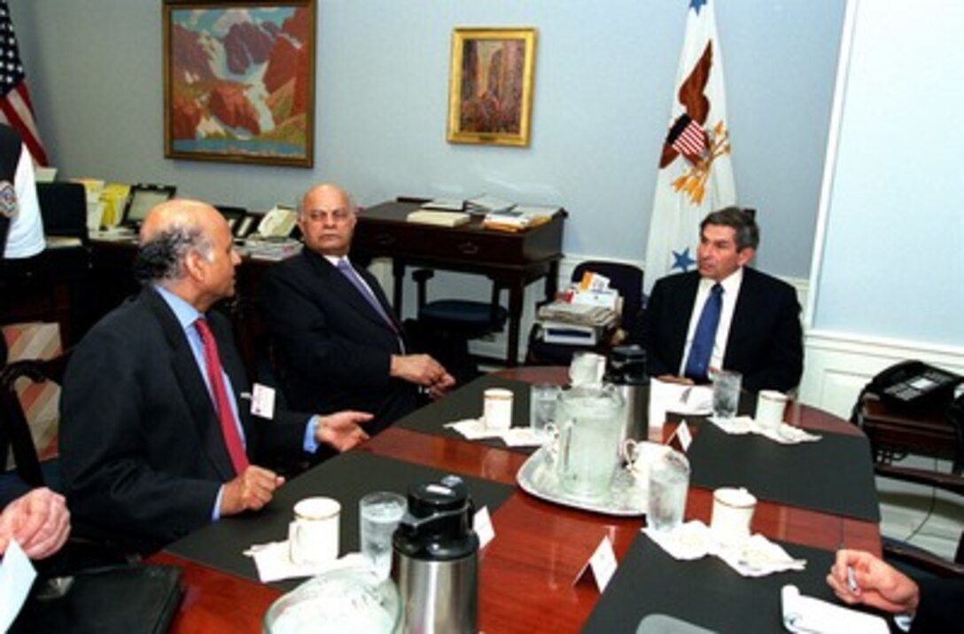 Indian Ambassador to the U.S. Lalit Mansingh (left) comments during a meeting of India's National Security Advisor Brajesh Mishra (center) and Deputy Secretary of Defense Paul Wolfowitz (right) at the Pentagon on Sept. 24, 2001. 