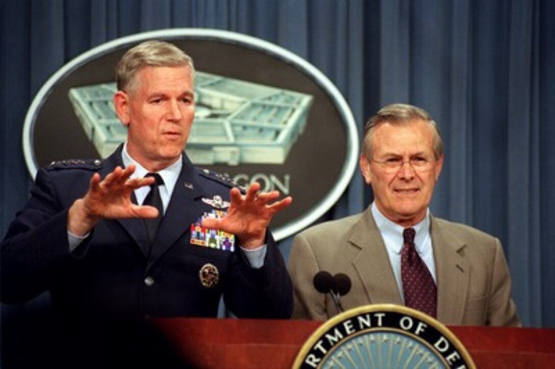 Chairman of the Joint Chiefs of Staff Gen. Richard B. Myers (left), U.S. Air Force, and Secretary of Defense Donald H. Rumsfeld brief reporters in the Pentagon on March 28, 2002, on the latest developments in the war on terrorism. 