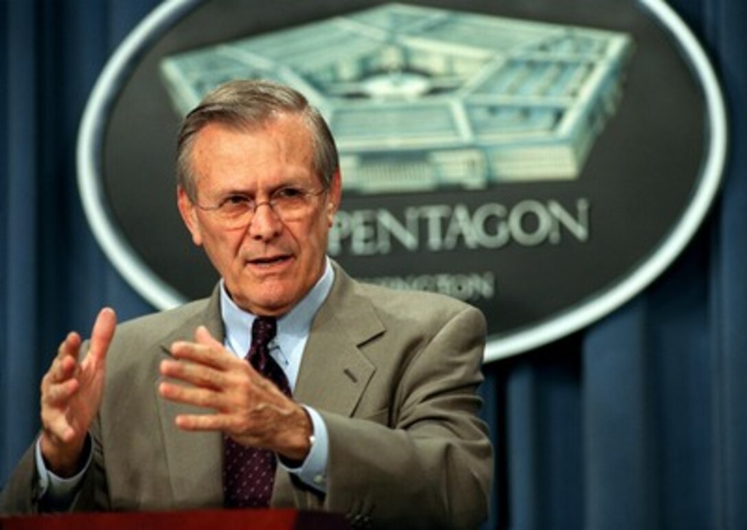 Secretary of Defense Donald H. Rumsfeld briefs reporters in the Pentagon on March 28, 2002, on the latest developments in the war on terrorism. 