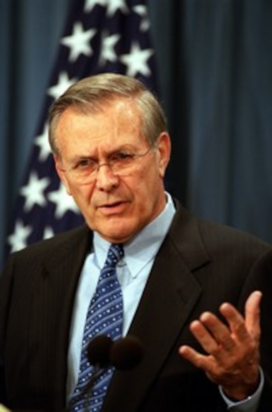 Secretary of Defense Donald H. Rumsfeld responds to a reporter's question on Operation Enduring Freedom during a Pentagon press briefing on April 8, 2002. 