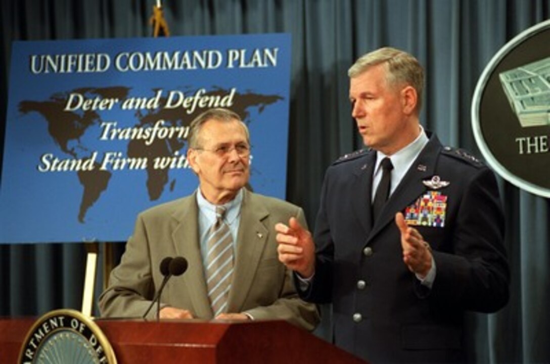Chairman of the Joint Chiefs of Staff Gen. Richard B. Myers (right), U.S. Air Force, explains some of the changes to the Unified Command Plan during a Pentagon press briefing with Secretary of Defense Donald H. Rumsfeld on April 17, 2002. The plan creates the U.S. Northern Command which will assume the mission of defending the United States and supporting the full range of military assistance to civil authorities. The changes were recommended in a report by Myers to President George W. Bush. The Unified Command Plan is the document that establishes the missions and responsibilities, as well as the geographic boundaries, of each combatant command. 