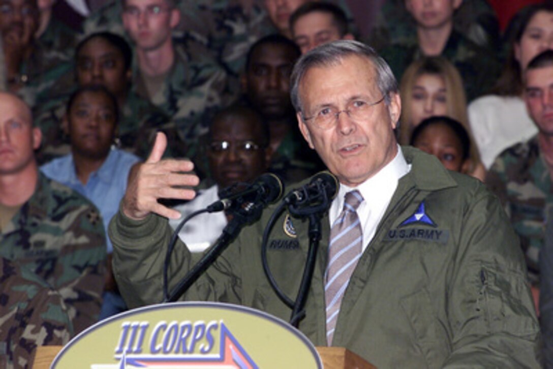 Secretary of Defense Donald Rumsfeld addresses soldiers, civilian employees, and family members at Fort Hood, Texas, during a town hall meeting on Aug. 21, 2002. 