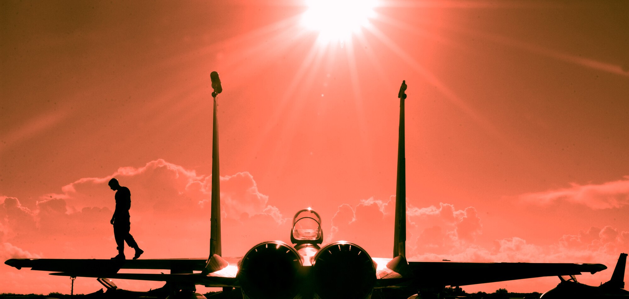 KEY WEST, Fla. -- A crew chief from the 159th Air National Guard, LA maintenance crew preflights a F-15 fighter jet on Oct. 23, 2002 for Exercise Cope Snapper 2002. Held at NAS Key West Florida, Exercise Cope Snapper  02 is a multi-aircraft exercise that engages dissimilar air combat training with on fighter data link and joint operations with the Navy. The members involved in Cope Snapper consist of the 159th Fighter Wing's, Louisiana F-15 fighters, the 169th McEntire, SC Air National Guard's F-16 fighter jets, maintenance crews, and the Navy's F-18s and F-14 fighter jets. (U.S. Air Force photo by Staff Sgt. Jeremy T. Lock)