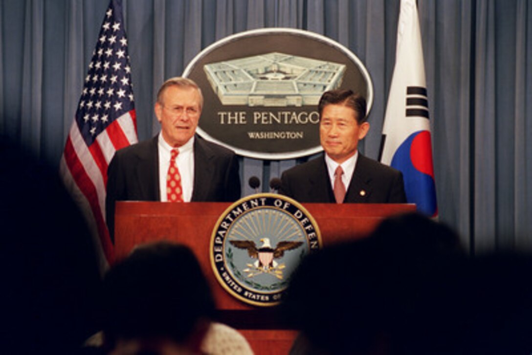 Secretary of Defense Donald H. Rumsfeld (left) and South Korean Minister of National Defense Lee Jun (right) conduct a joint press conference at the close of the annual U.S.-Republic of Korea Security Consultative Meeting at the Pentagon on Dec. 5, 2002. Rumsfeld and Lee discussed a broad range of bilateral security issues ranging from ways to promote peace and stability on the Korean Peninsula to the global war on terrorism. 