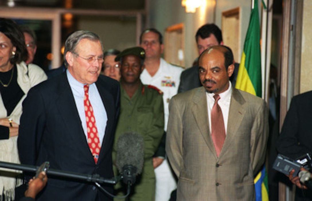 Secretary of Defense Donald H. Rumsfeld and Prime Minister Meles Zenawe conduct a joint media availability following their meeting on Dec. 10, 2002. Rumsfeld traveled to Addis Ababa, Ethiopia, to meet with leaders concerning defense issues and the war on terrorism. 