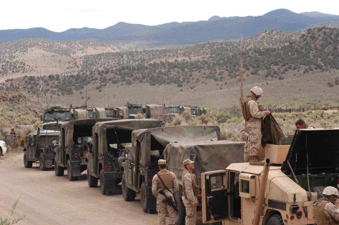 Company C., 1st Battalion 23rd Marine Regiment prepares to begin a convoy operations practice on the training grounds of the Marine Corps Mountain Warfare Training center here June 14. The training is part of exercise Javelin Thrust 2009, which is the annual training exercise for more than 2000 Reserve Marines and allows units to practice and prepare for overseas deployments.